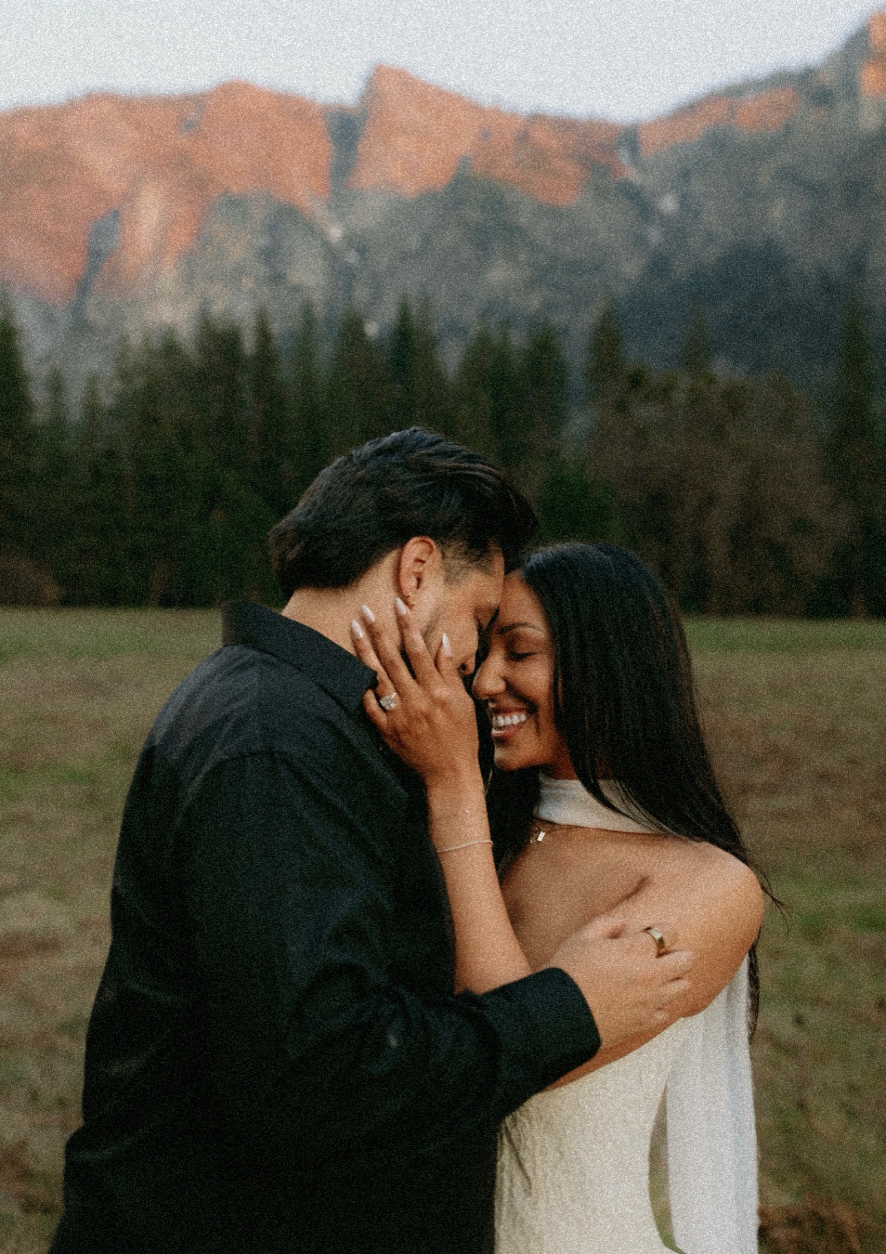 Tamara and Christian embracing in Yosemite at sunset